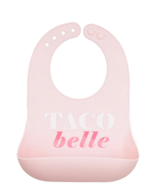 Pink silicone bib with the words "Taco Belle"